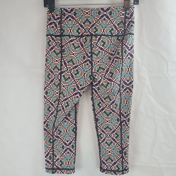 Victoria's Secret VSX Sport (XS) Knockout Crop Leggings Orange, Purple, Green - Picture 4 of 8